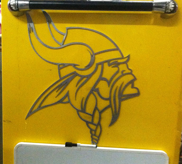 Outline of Viking Head hanging on metal box